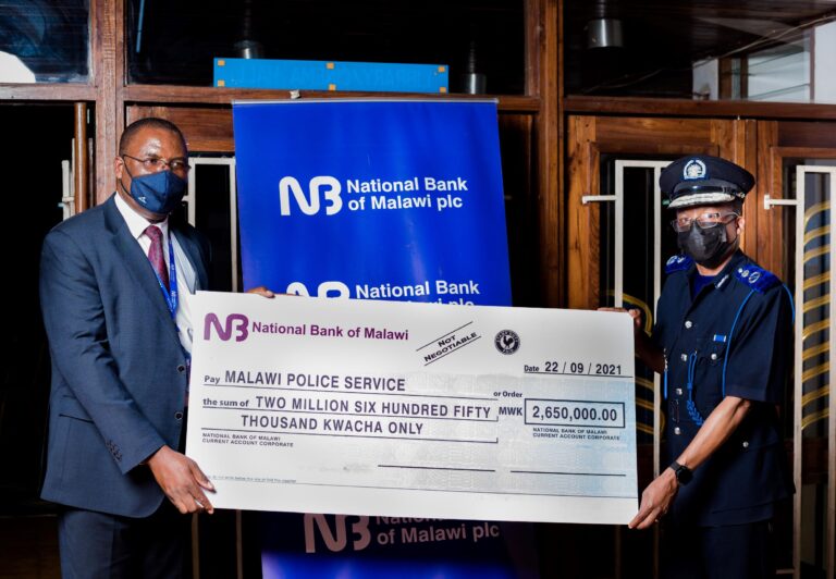 NBM plc gives Police K2.6 million for centenary celebrations